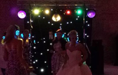 Black Gold Rig with mirrorball, Starcloth backdrop and uplighters (night time)