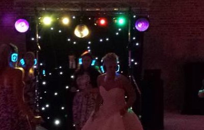 Black Gold Rig with mirrorball, Starcloth backdrop and uplighters (night time)