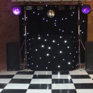 Black Gold Rig with mirrorball, Starcloth backdrop and uplighters (daylight)