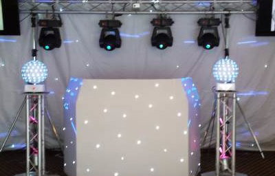 Large white hi-tech rig with TVs