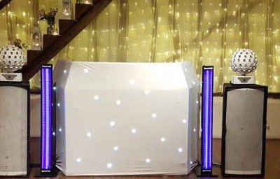Mini-Hi-Tech Rig with white Starcloth DJ booth and UV tubes