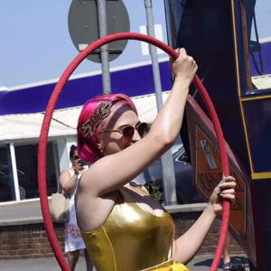 Chicas Locas Burlesque Hula hooping in parade