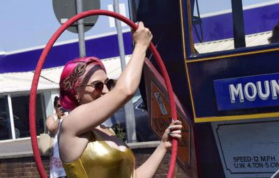 Chicas Locas Burlesque Hula hooping in parade
