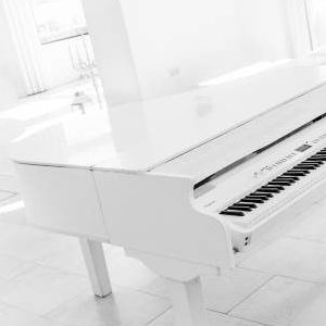 White Baby Grand Piano