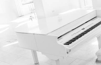 White Baby Grand Piano