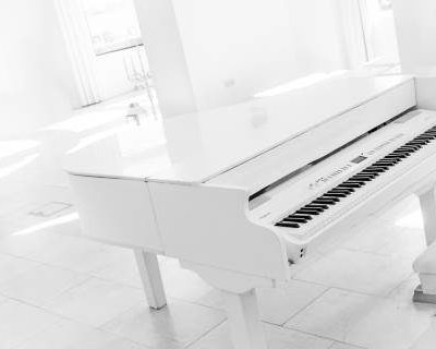 White Baby Grand Piano