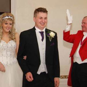 The Bride and Groom Enter Their Wedding Breakfast to Great Applause