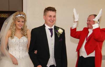 The Bride and Groom Enter Their Wedding Breakfast to Great Applause