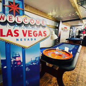 Roulette Blackjack tables Vegas logo