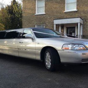 Silver Limo. Perfect for Parties Weddings and Proms. We also have a silver Chrysler 8 seat limo