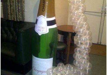 Champagne Bottle and Balloon Display Slough