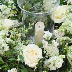 white hurricane vase table centre