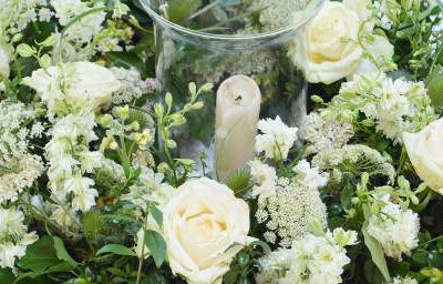 white hurricane vase table centre