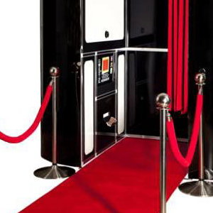 black photobooth with red carpet