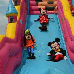 They Go Onto Bouncy Castles With the Children 