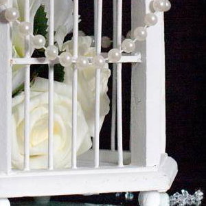 Vintage birdcage table centrepiece hire in Hertfordshire, Bedfordshire, Essex & surrounding areas. Perfect for weddings, birthdays & corporate events