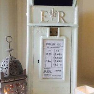 White-Cast-Iron-Post-Box-with-Silver-Writing-£30-to-hire