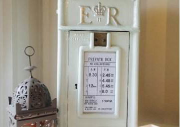 White-Cast-Iron-Post-Box-with-Silver-Writing-£30-to-hire