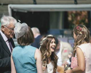 A very happy bride at a wedding for 130