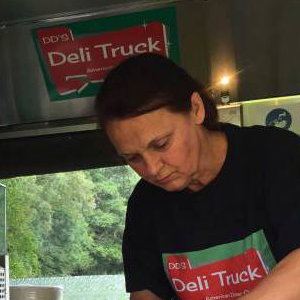 Preparing fresh salads on site in the Deli truck 