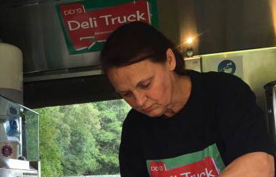 Preparing fresh salads on site in the Deli truck 