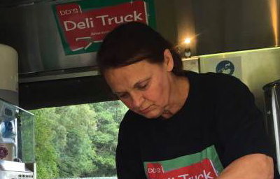 Preparing fresh salads on site in the Deli truck