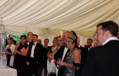 Listening to Speeches at the Gatsby Party