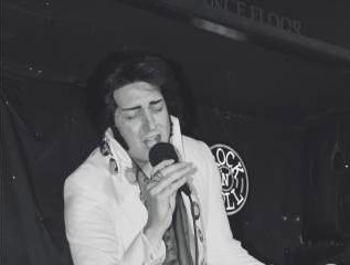 James Burrell as Elvis Presley