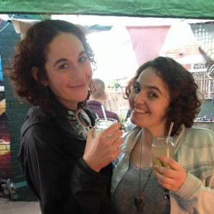 Happy customers sipping on floral summery cocktails!