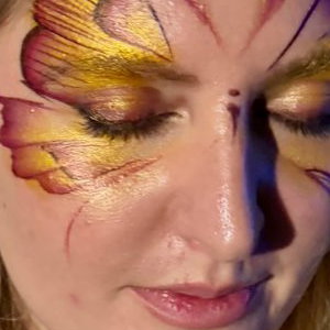 Butterfly face paint for adults by Faces by Sandra 