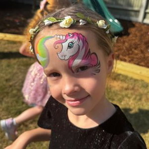 Unicorn face painting by Faces by Sandra 