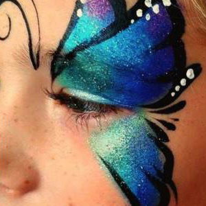 Face painting single eye butterfly