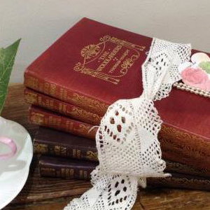 books pearls cup saucer confetti