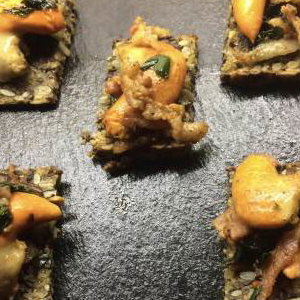Scallop roe, wild garlic, shallot on 3 seed rye bread