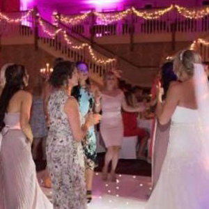 Twilight package @ Gisborough Hall, Starlit white Led dance floor, pink & purple uplighting and our giant illuminated Mr & Mrs.