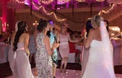 Twilight package @ Gisborough Hall, Starlit white Led dance floor, pink & purple uplighting and our giant illuminated Mr & Mrs.