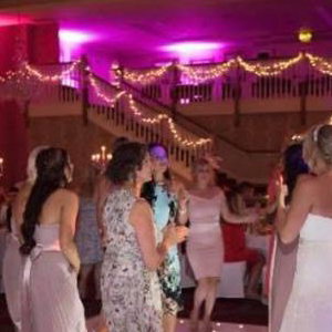 Twilight package @ Gisborough Hall, Starlit white Led dance floor, pink & purple uplighting and our giant illuminated Mr & Mrs.
