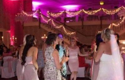 Twilight package @ Gisborough Hall, Starlit white Led dance floor, pink & purple uplighting and our giant illuminated Mr & Mrs.