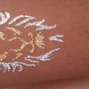 Lion glitter tattoo