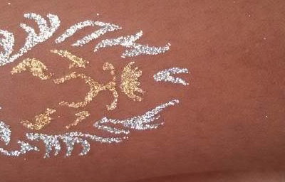 Lion glitter tattoo