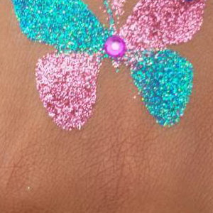 Butterfly glitter tattoo with gems