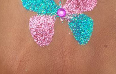 Butterfly glitter tattoo with gems