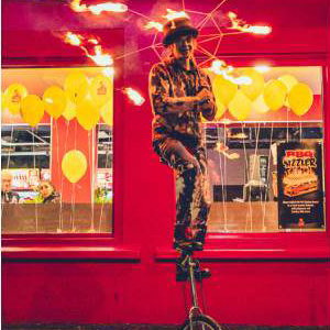 Fire-Umbrella-Unicyclist--at-Pepes-Piri-Piri-Paisley