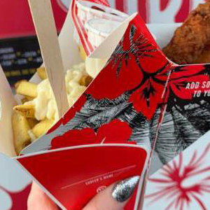 Surf N Fries packaging - all in one hand