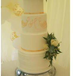 Elegant 4 tier wedding cake by a Cambridge cake designer 