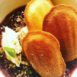 Almond madeleines with raspberry compote and citrus creme fraiche 