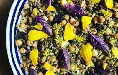 five rice salad with edible flowers and fennel top