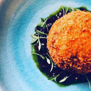 chorizo quail egg with onion relish  