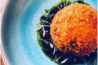 chorizo quail egg with onion relish