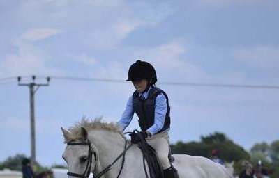 white-horse-jumping-child-white